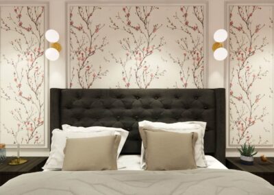 A modern bed with a tufted headboard and floral wallpaper panels.