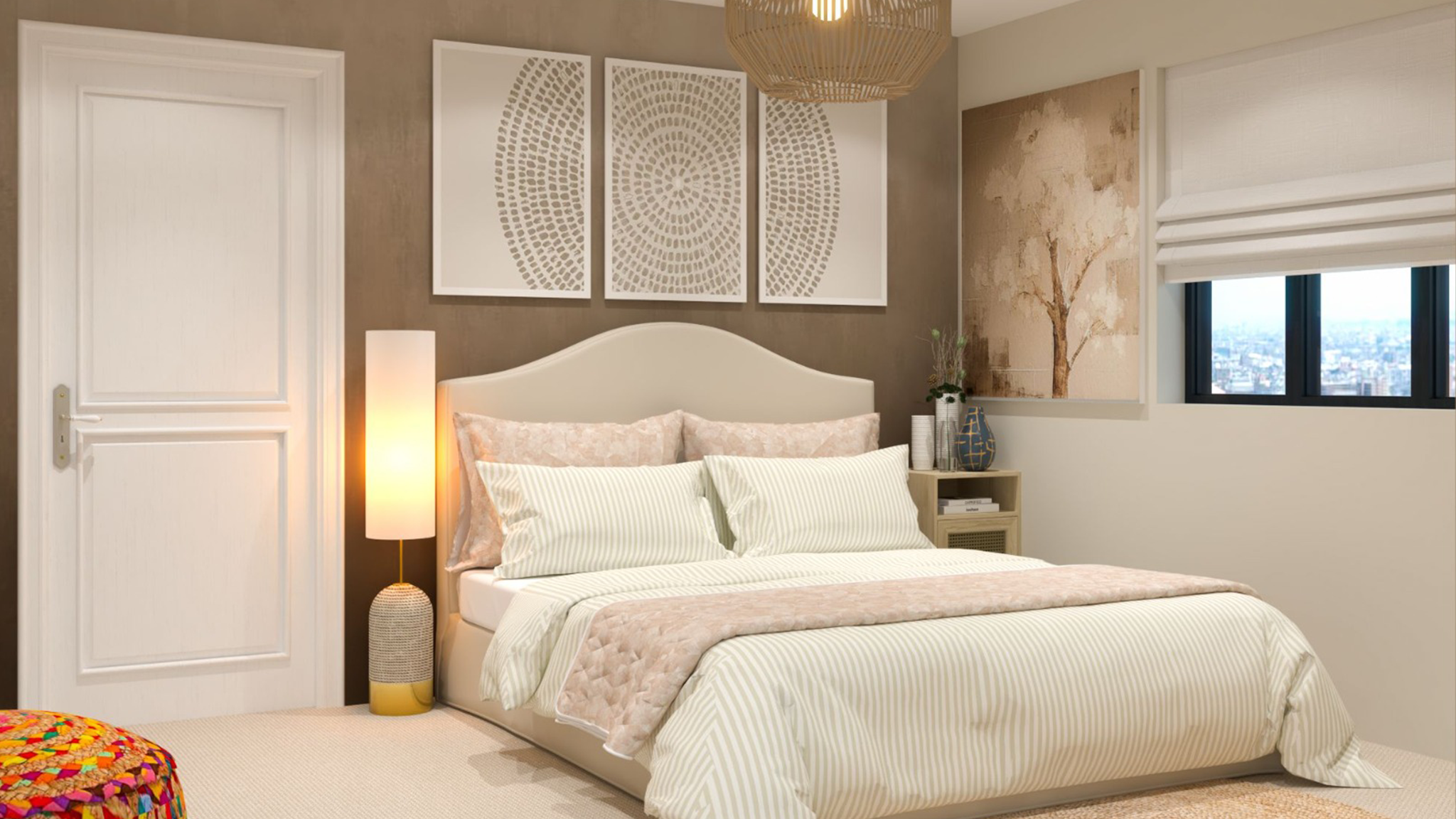 A cozy bedroom with a neatly made bed featuring striped bedding and pink accents